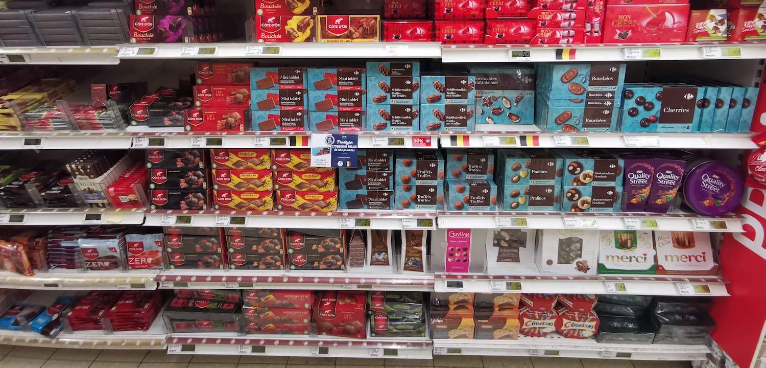 Store shelves with chocolate brands